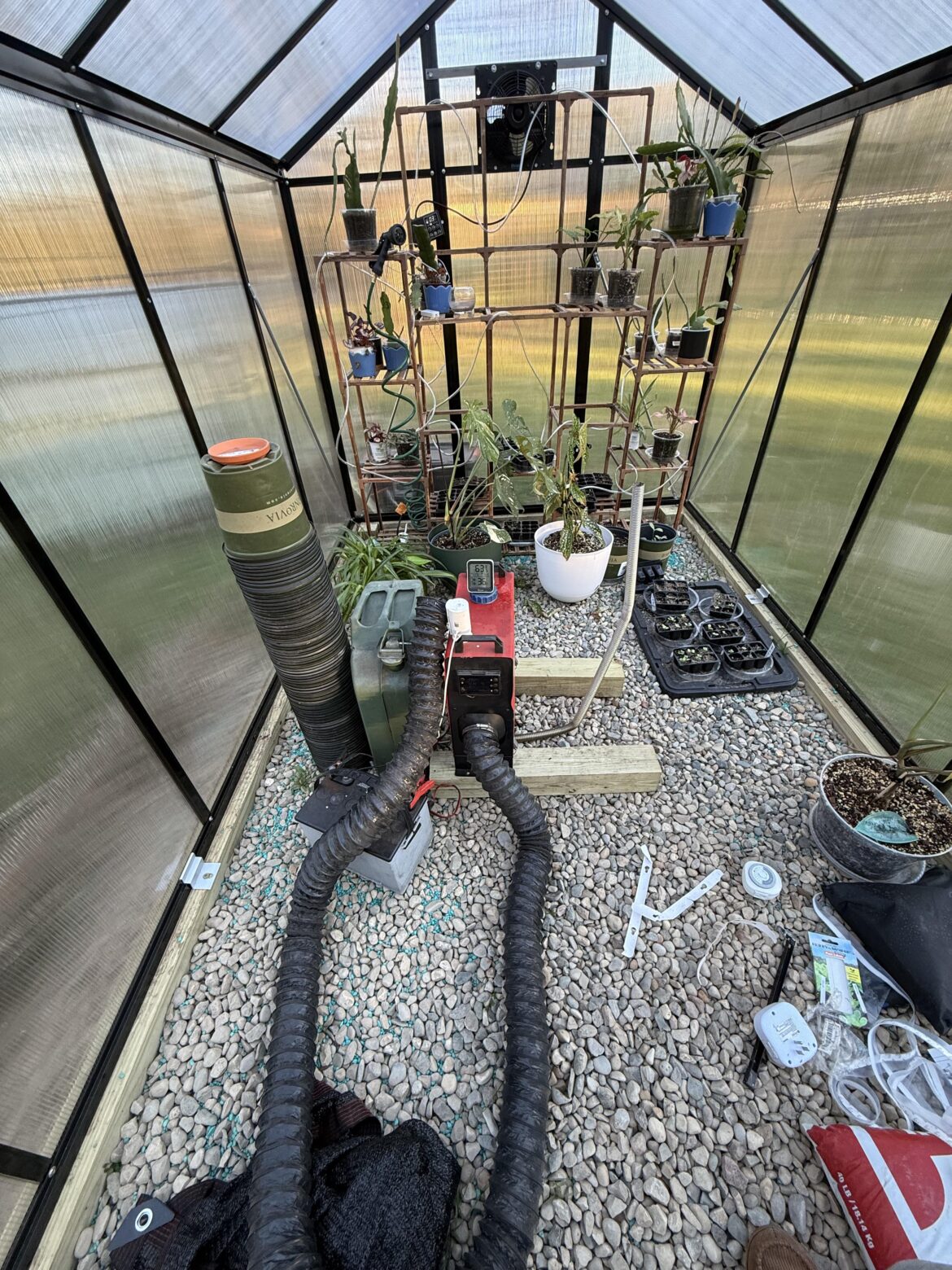 My quick, cheap, easy solution to keep the greenhouse warm during tonight’s freeze.