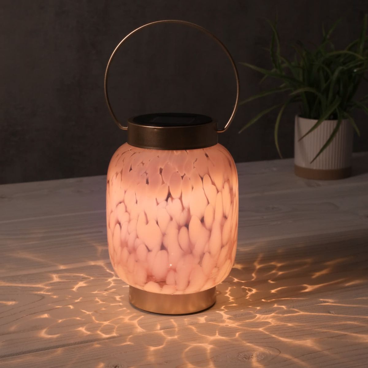 B&M has discounted the Solar Powered Confetti Glass Lantern