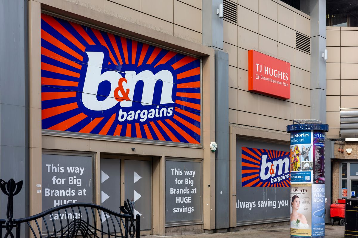 Exterior of a B&M Bargains logo outside the Wellgate Shopping Centre in Dundee 