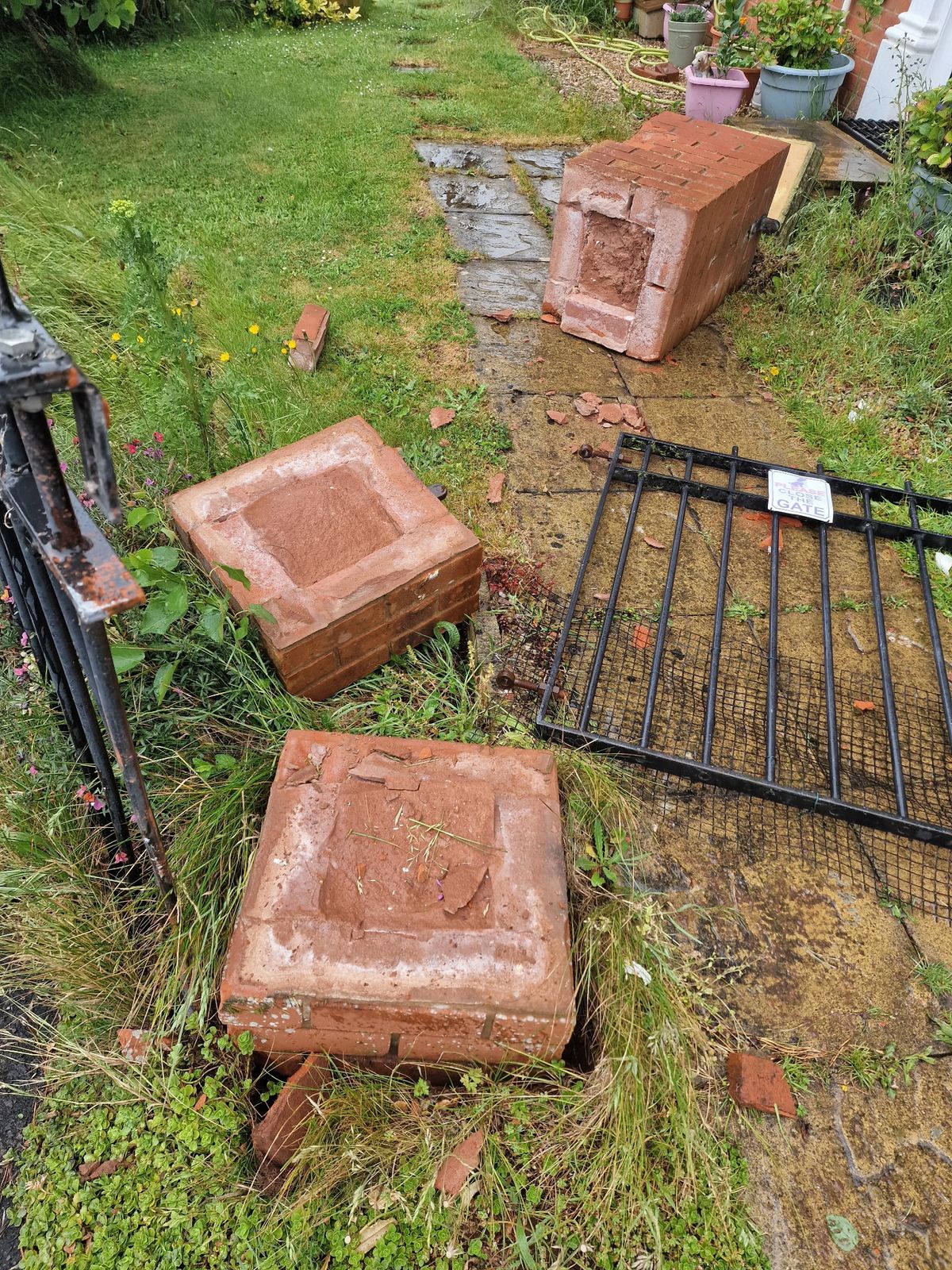 A brick pillar was knocked clean over in the crash