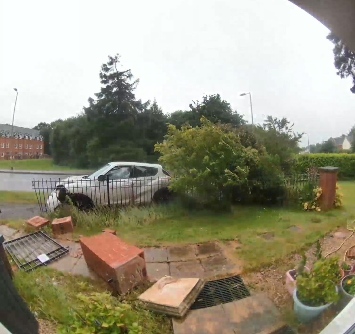 Doorbell footage captured a white car driving away from the scene
