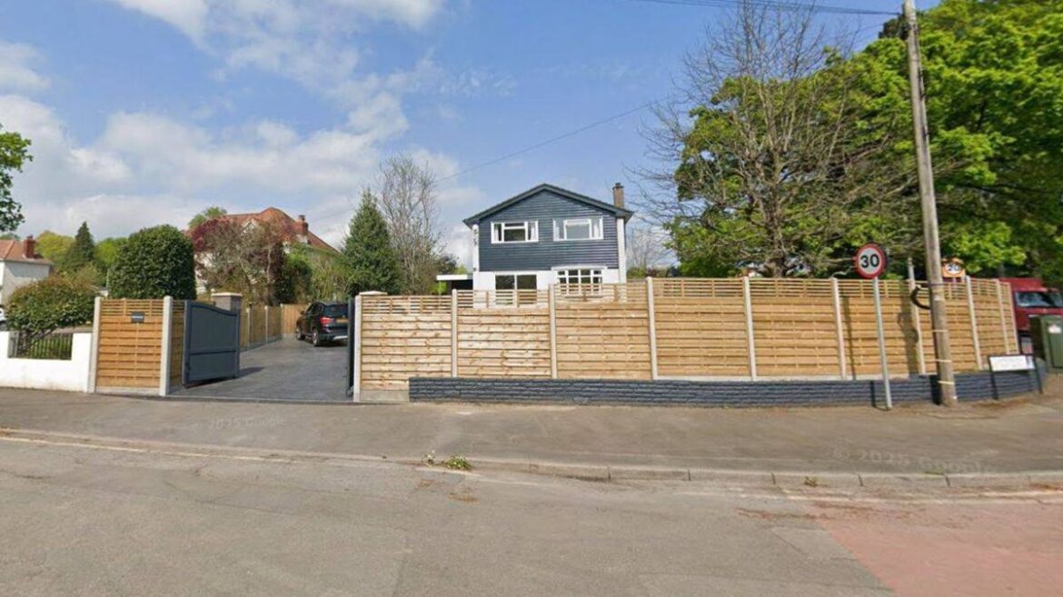 Family ordered to take down garden fence after planning dispute Wales Online