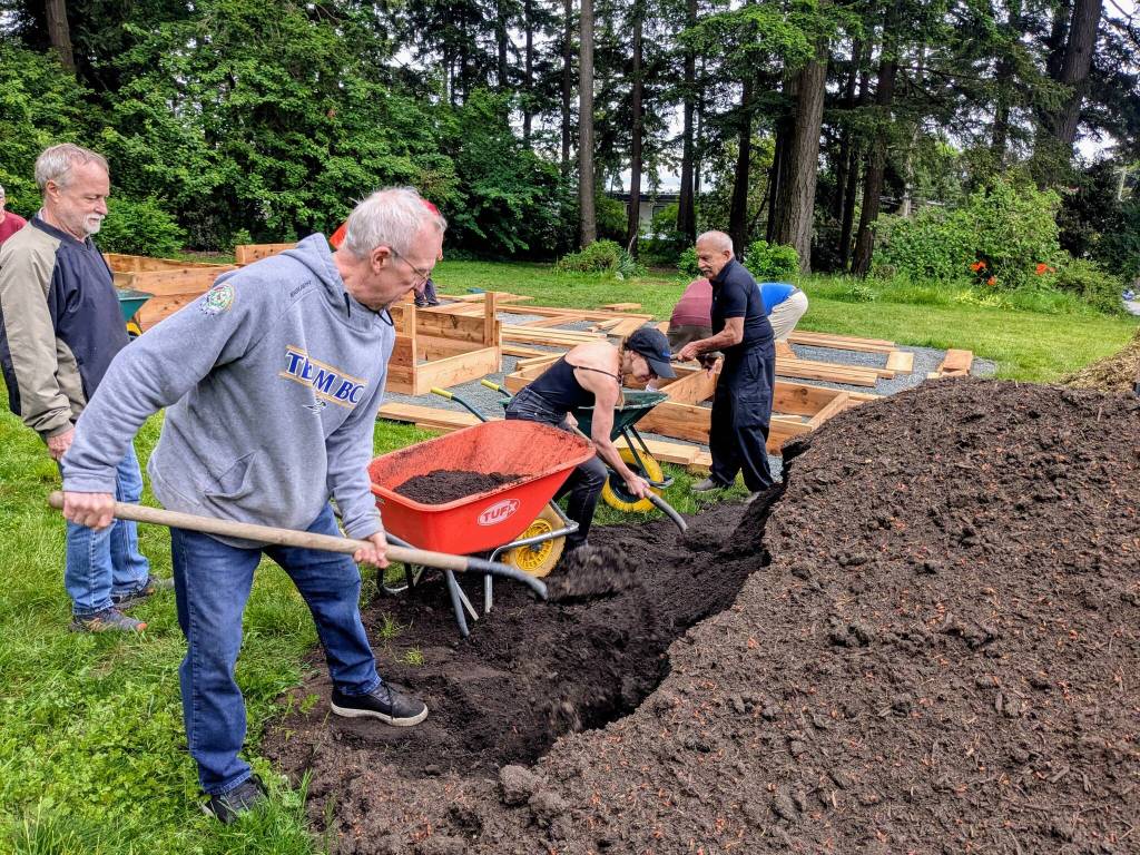 White Rock Rotary helps build Hogg Park garden John Hogg and Gordon Hogg (at left), with White Rock Rotary president Kristina Eng and Rotarian Moti Bali beyond, participate in the building of a pilot-project community garden at Dr. R.J. Allan Hogg Rotary Park. (Alex Browne/Peace Arch News)