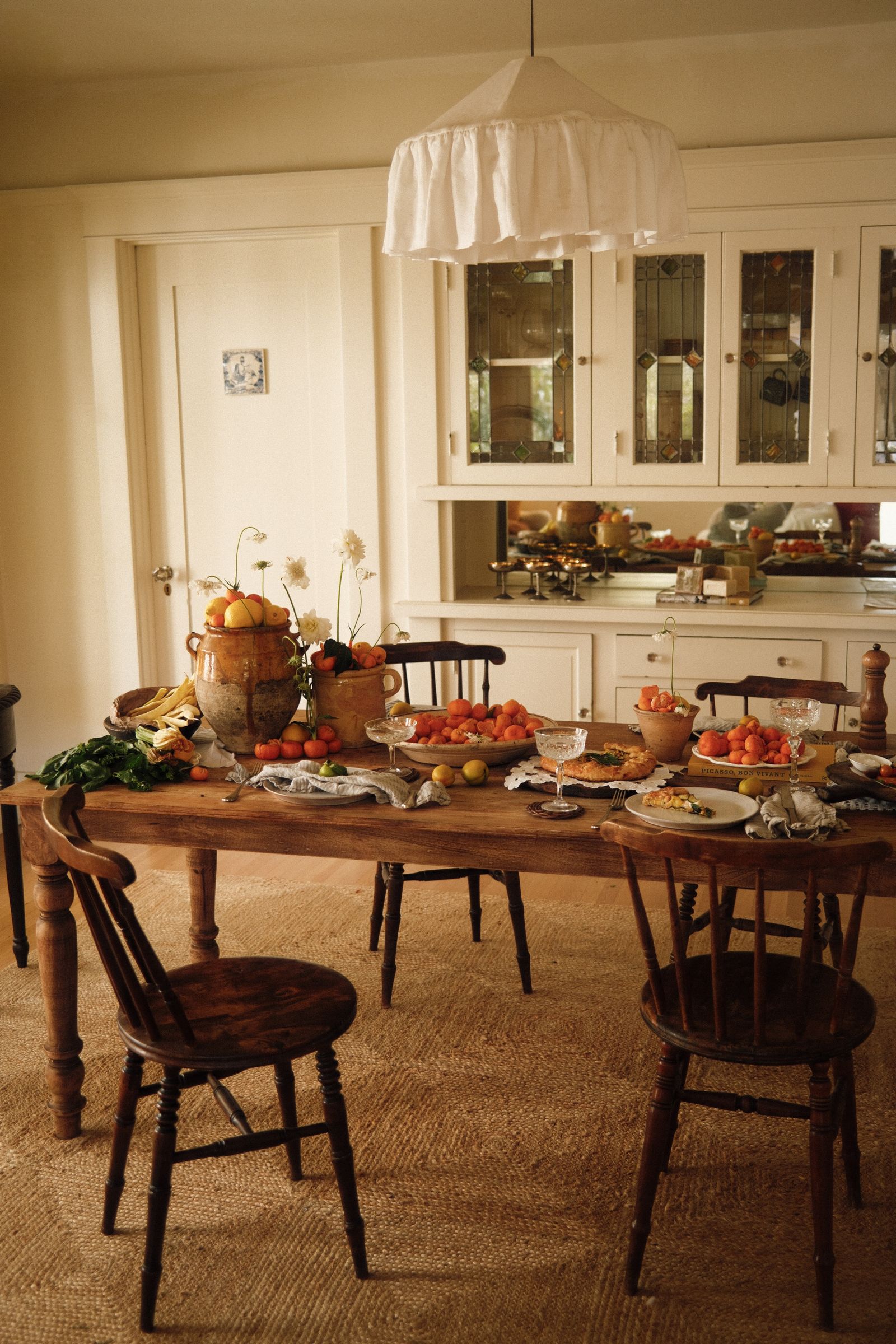 Image may contain Architecture Building Dining Room Dining Table Furniture Indoors Room Table Kitchen and Chair