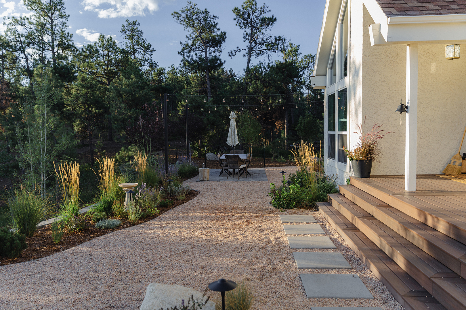 backyard with gravel and dining area