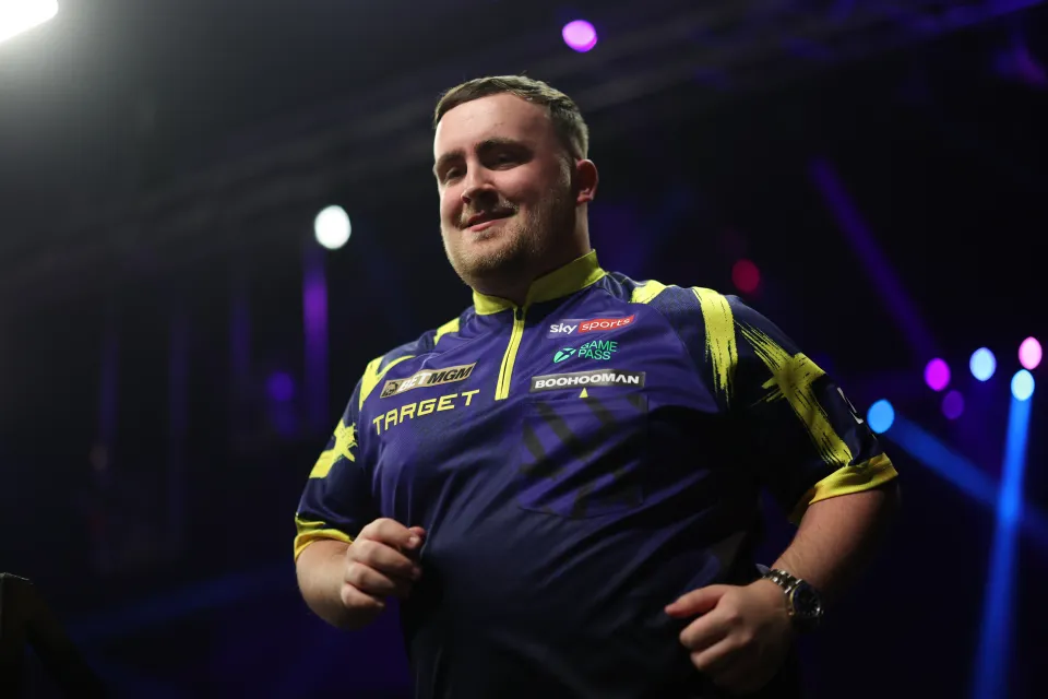 Luke Littler makes his entrance ahead of the final against Jonny Clayton in the BetMGM Premier League Darts
