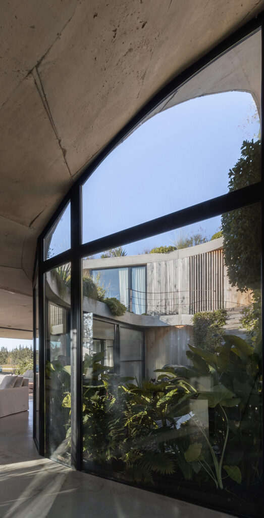 rooftop garden crowns concrete house shaped by spiraling patios rooftop garden crowns concrete house shaped by spiraling patios