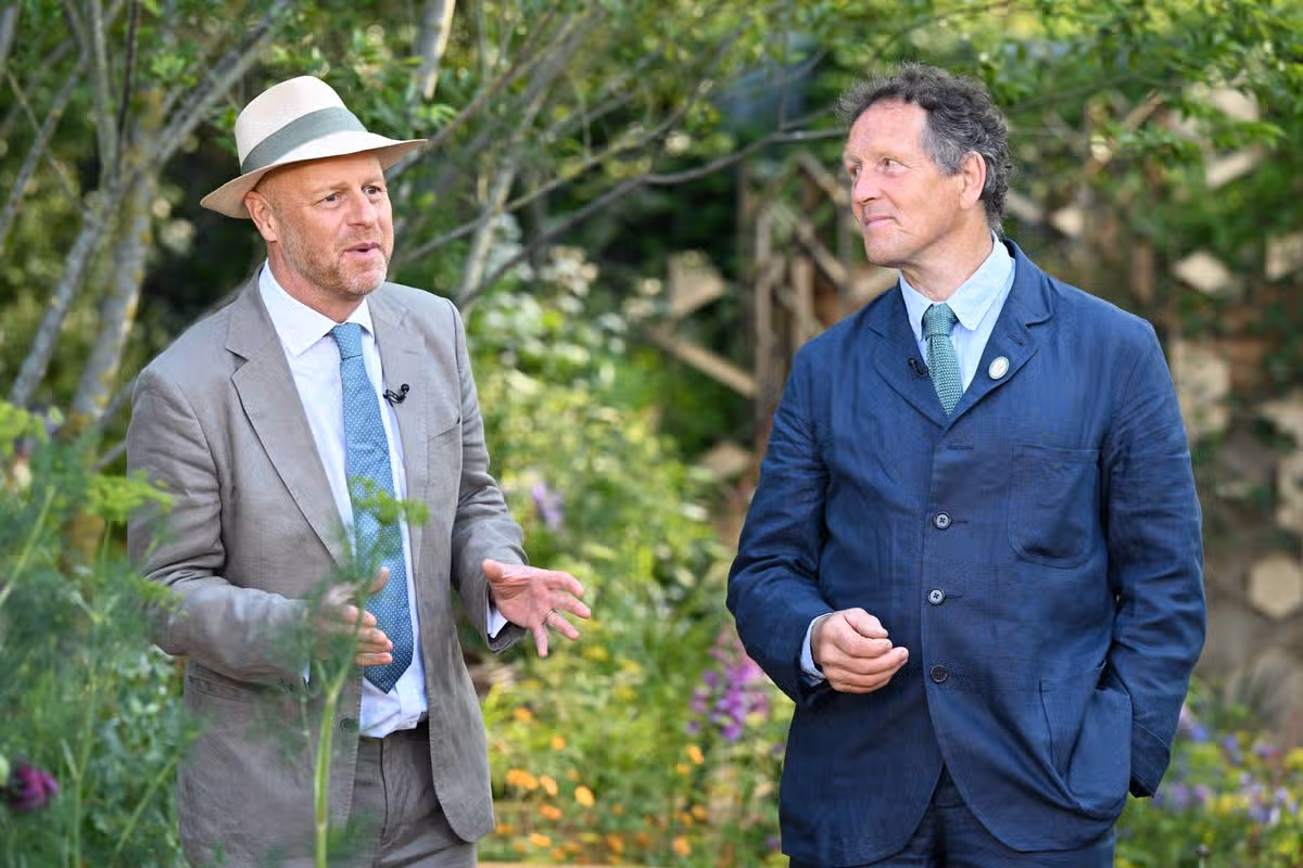 LONDON, ENGLAND - MAY 20: Joe Swift and Monty Don speak as they attend The RHS Chelsea Flower Show at Royal Hospital Chelsea on May 20, 2024 in London, England. All the main garden categories return to the Royal Hospital Chelsea this year. The Show Gardens along Main Avenue, Sanctuary and Feature Gardens explore themes through horticulture, while the All About Plants area in the Floral Marquee focuses on planting. This year is billed as the most sustainable to date. (Photo by Jeff Spicer/Getty Images)