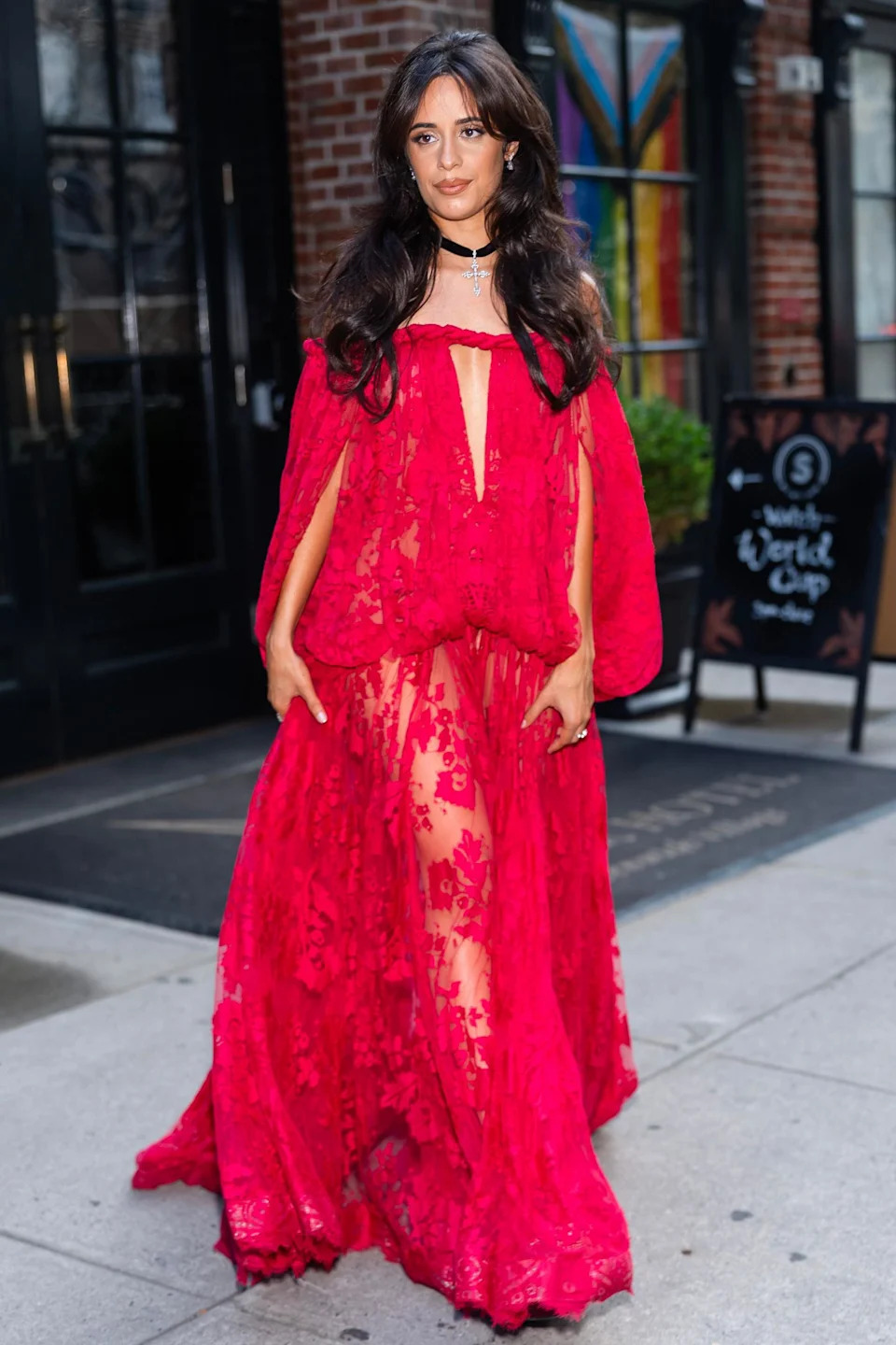 Camila Cabello in a long red dress