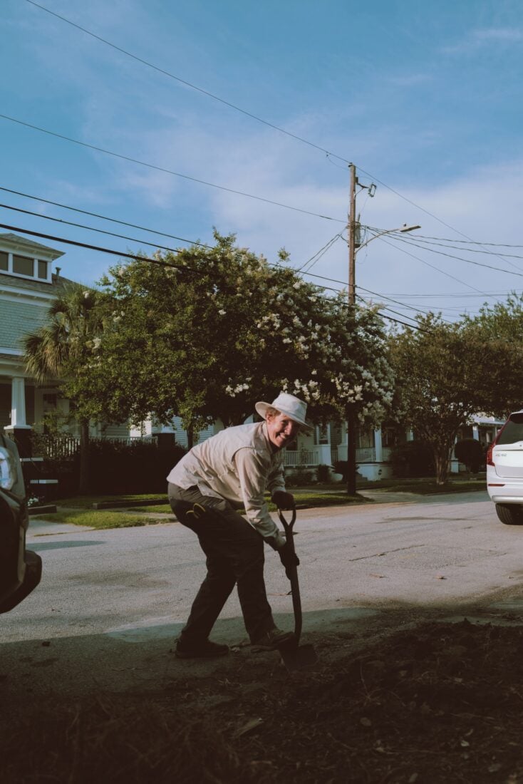 A woman with a shovel