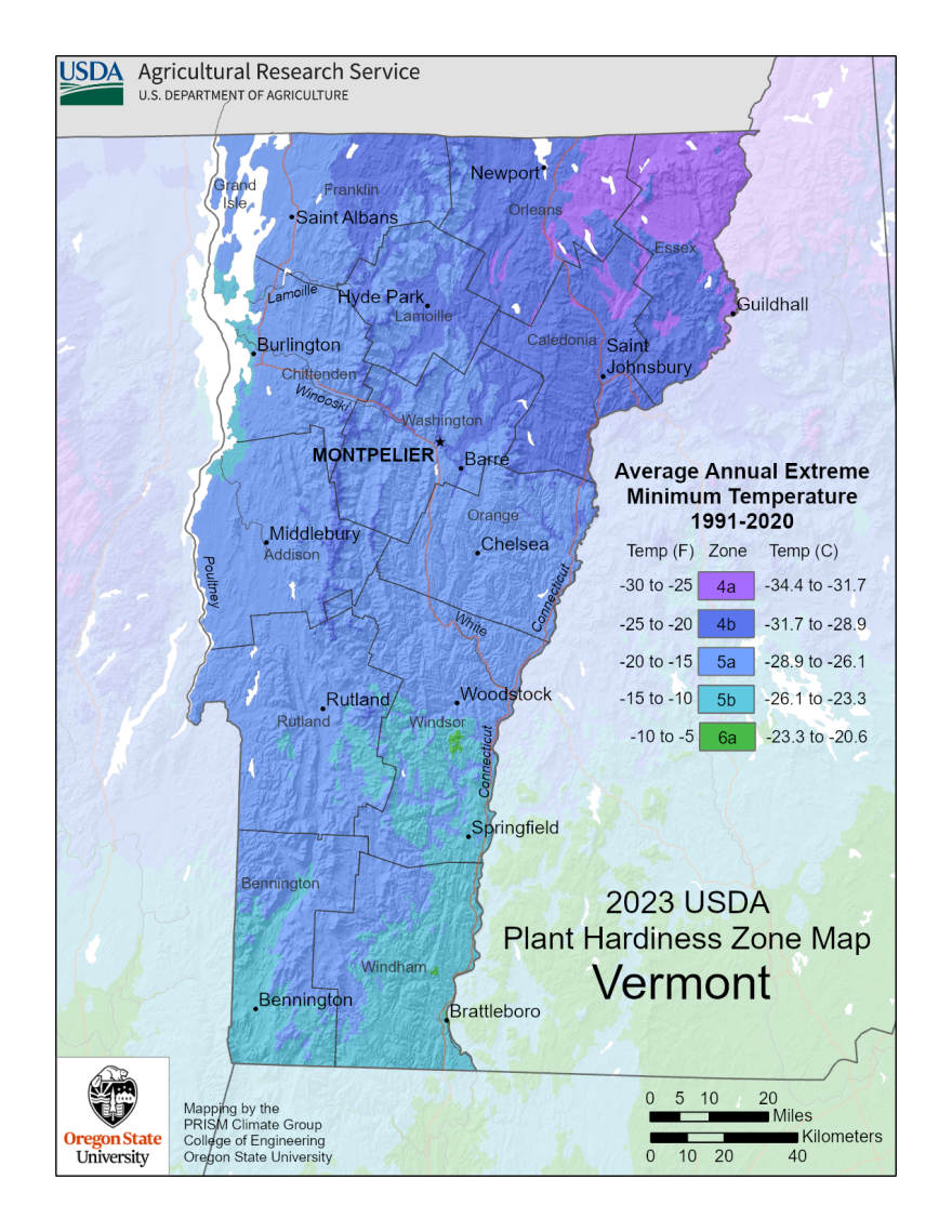 A map of Vermont with light and dark blue coloring shows average extreme minimum temperatures.