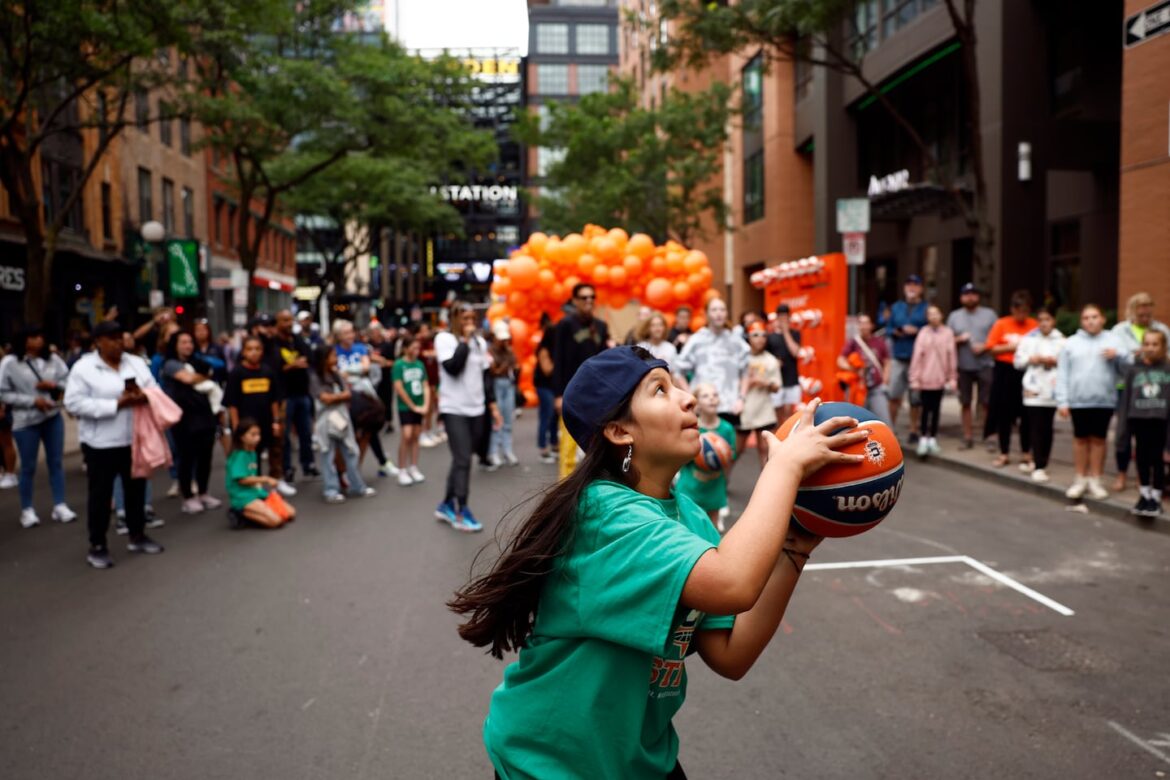 Kids play a game of knockout during the Sun block party on Canal Street in 2024.