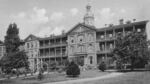 The front yard of the Providence Academy, circa 1910, where a fountain is situated at the center of the heart-shaped path.