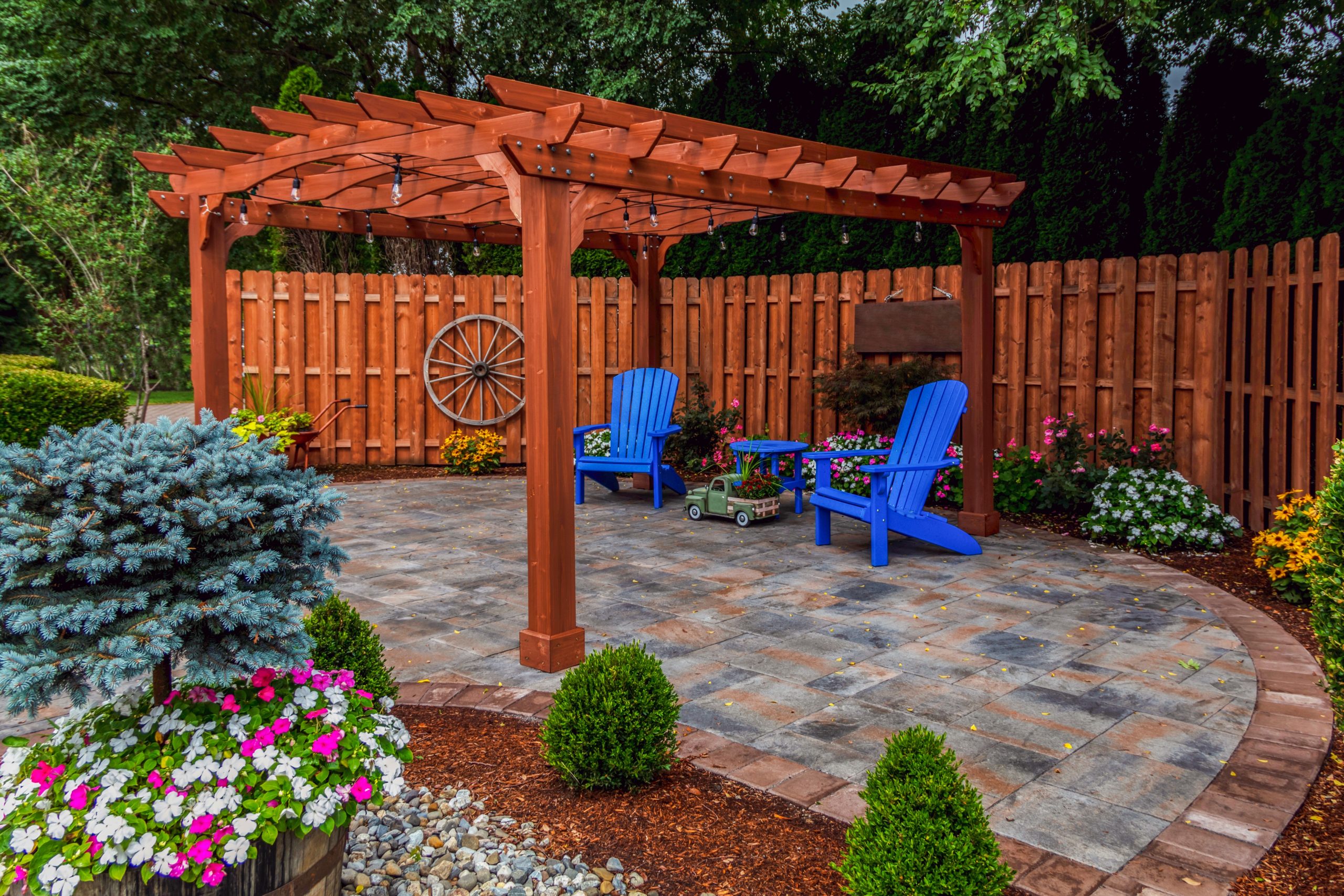 wooden pergola on pavement, backyard