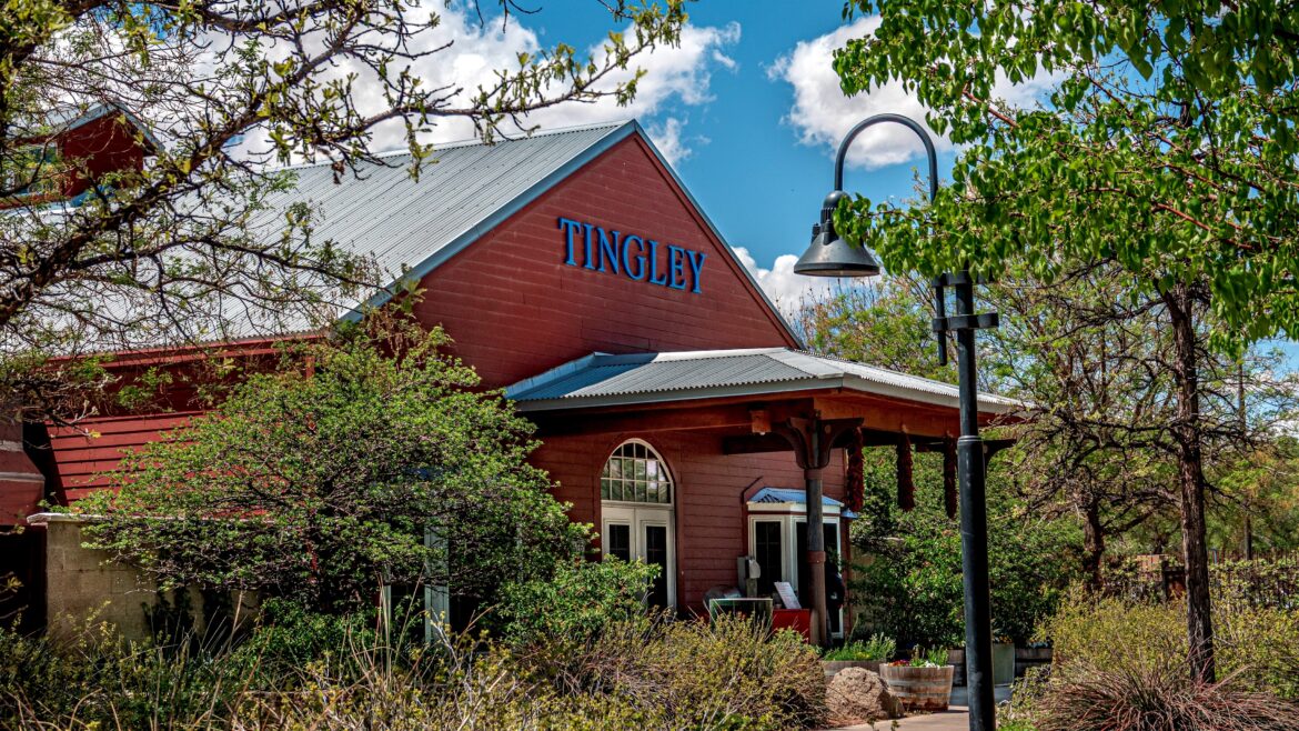 Tingley Beach — City of Albuquerque A photo of the Tingley Station flanked by lush foliage on a sunny summer day