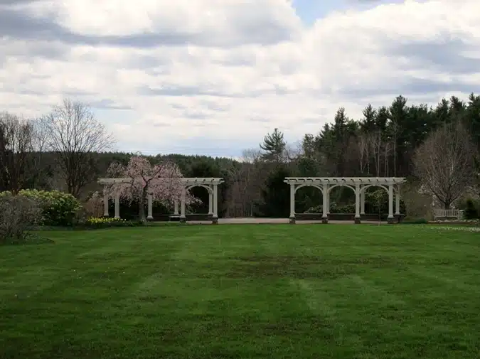 The stone staircase leading to the Secret Garden is just beyond the pergolas.