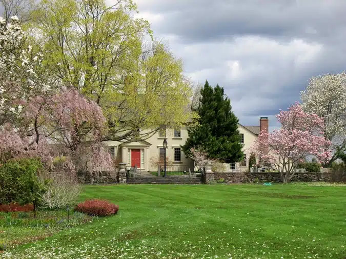 Tower Hill farmhouse with blossoms