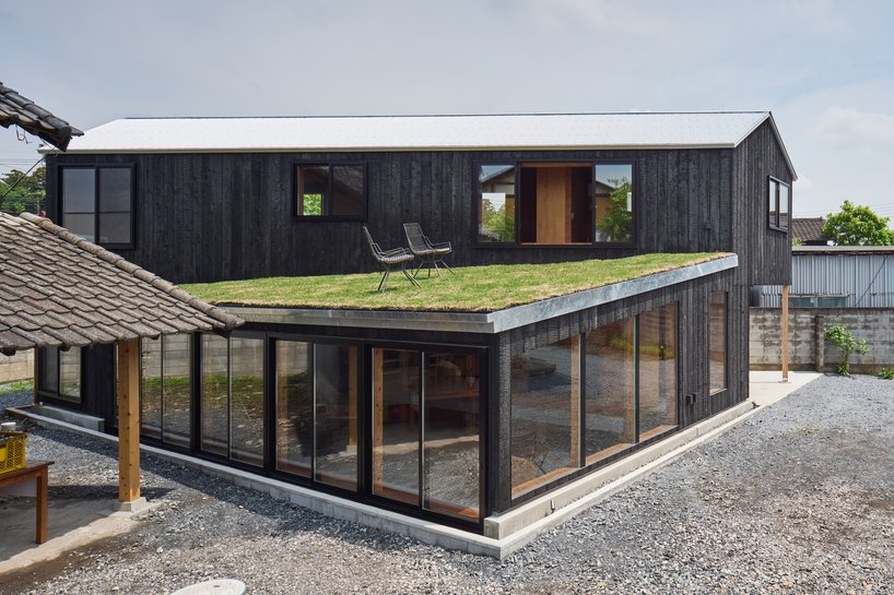 planted roof extends garden over tato architects’ timber house in mibu, japan - 2